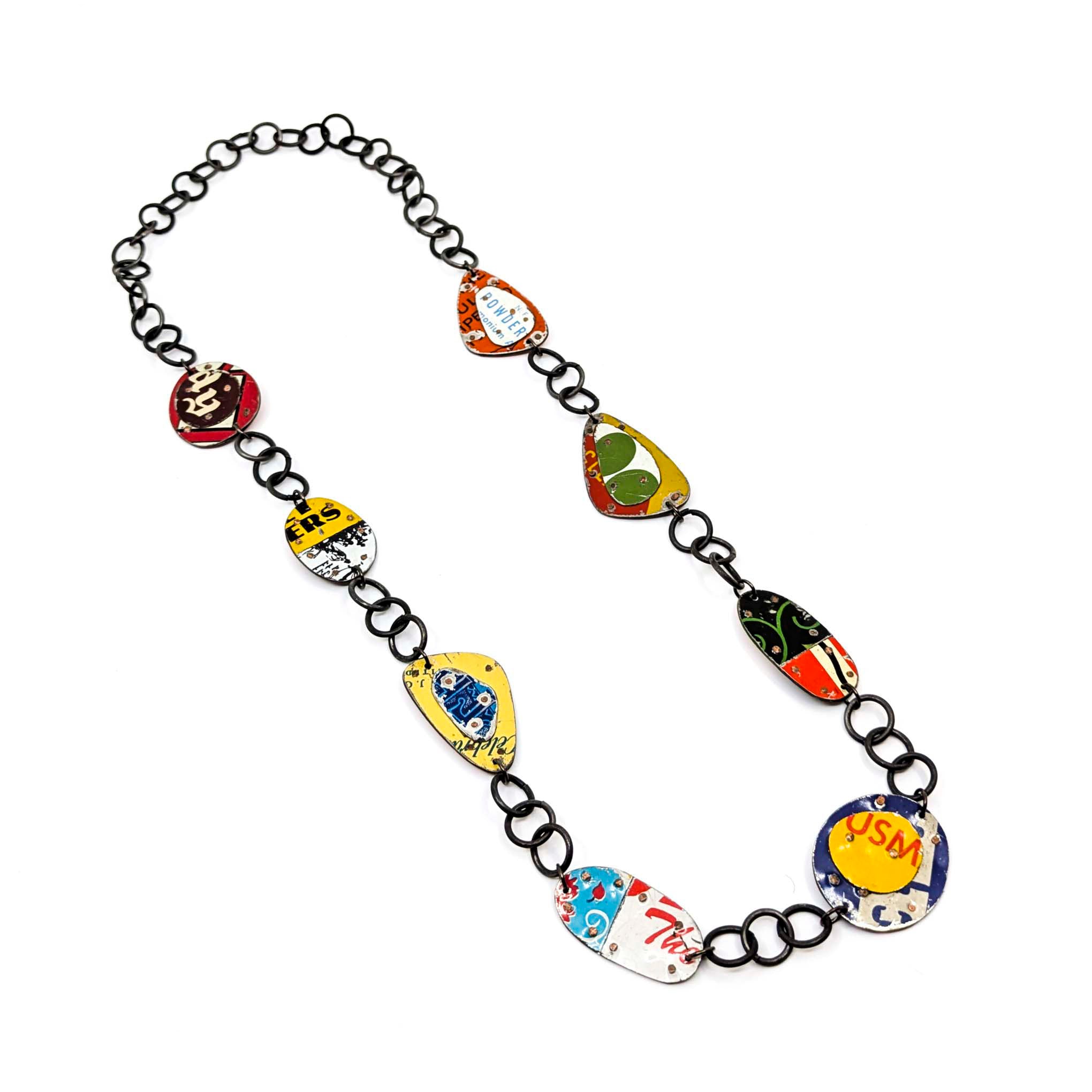 Necklace with colorful pendant charms on a white background