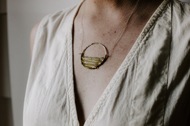 Necklace by Melainie Brauner of VERSO jewelry at VISUAL INDEX art gallery.