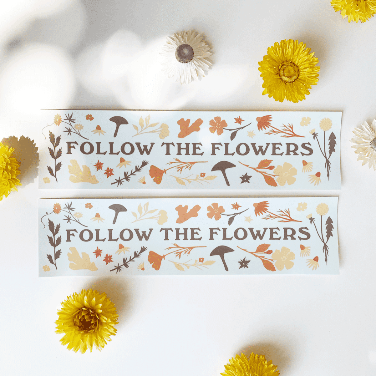 Oregon artist, Elana Gabrielle's bumper sticker- Follow the Flowers- shoppable at Visual Index.